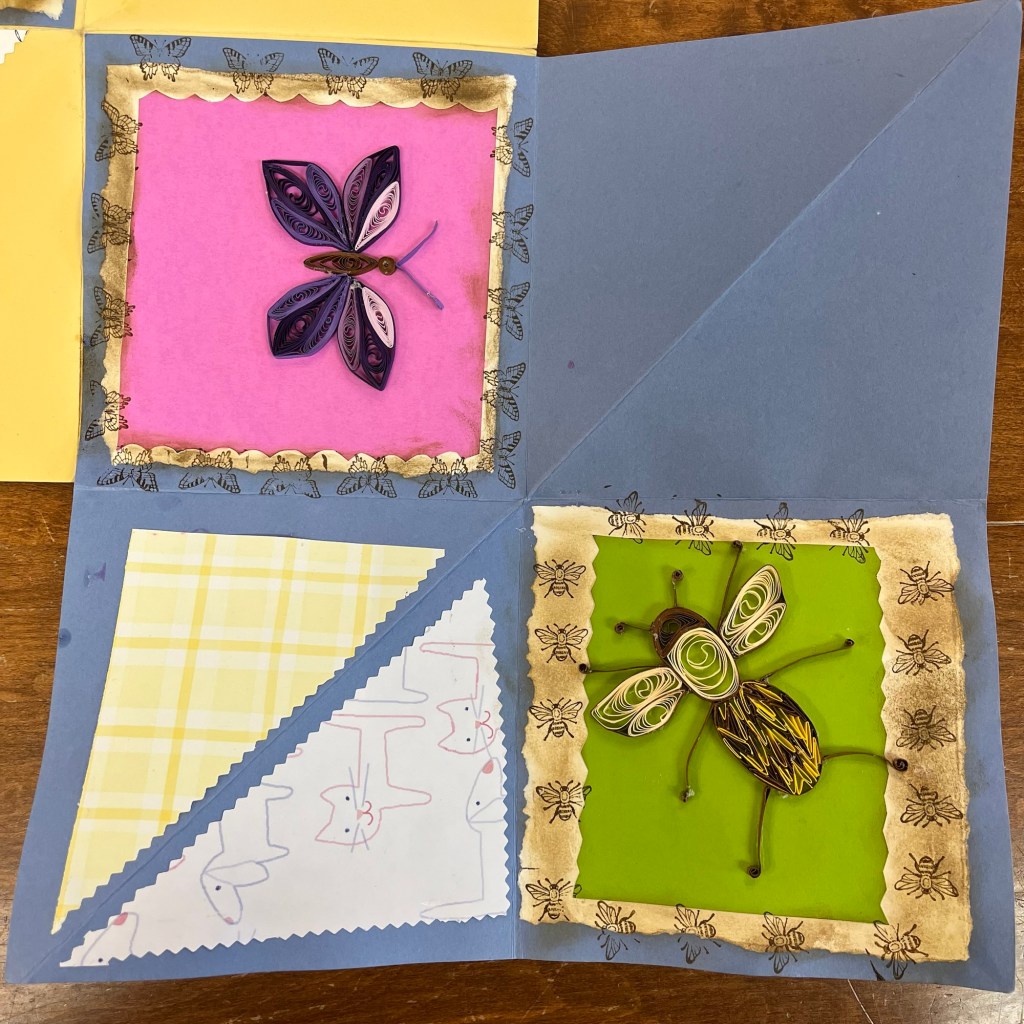 paper quilling images of a purple butterfly and bee
