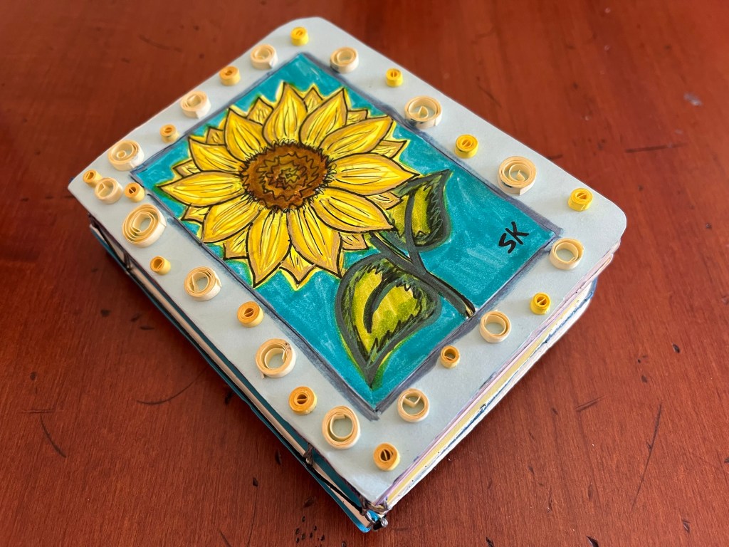 paper quilling decorating blue and yellow sunflower book
