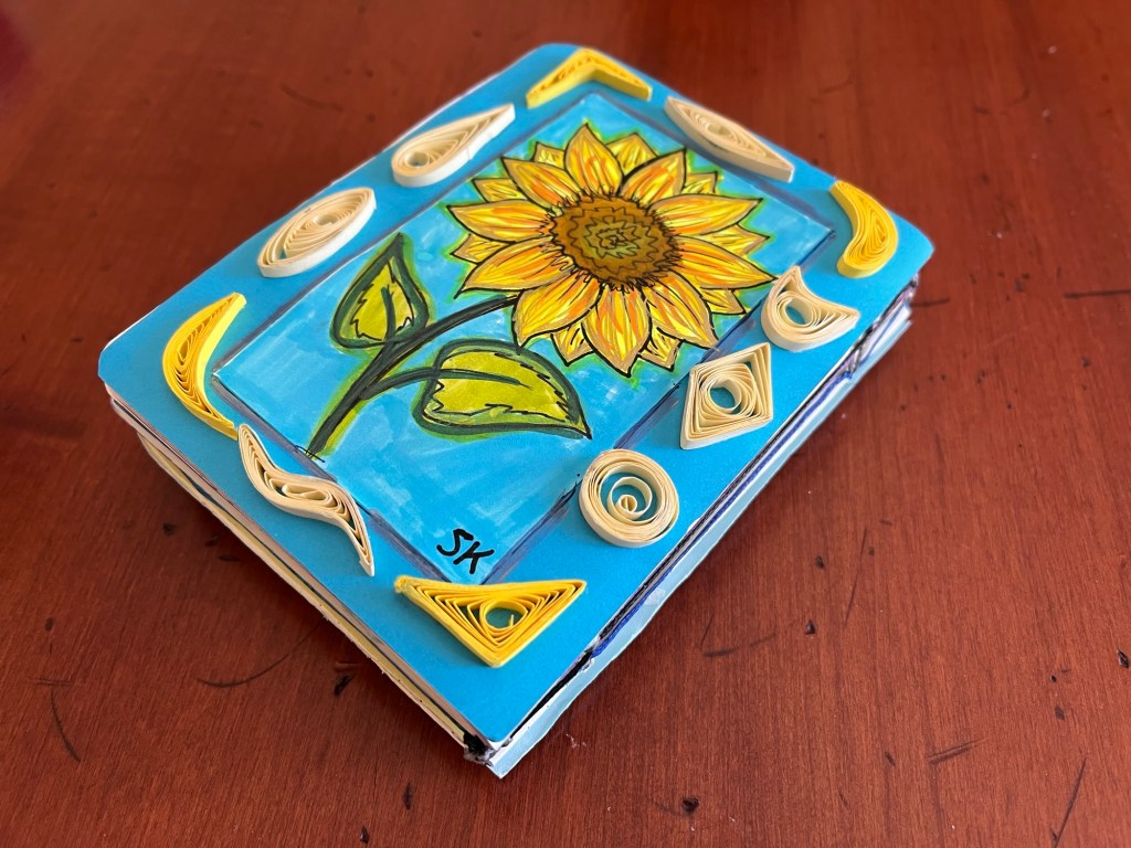 paper quilling decorating blue and yellow sunflower book