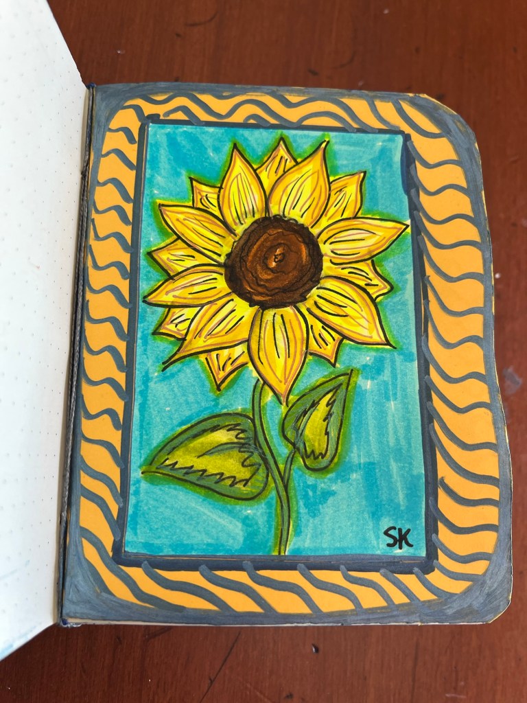striped patterns surrounding a sunflower drawing