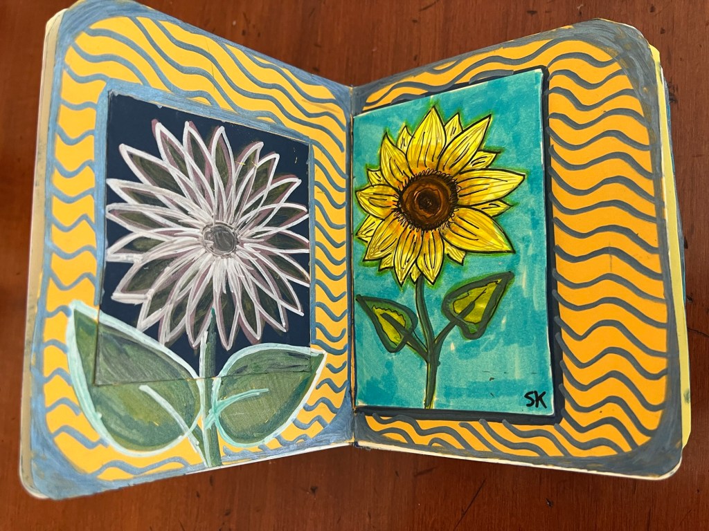 striped patterns surrounding two sunflower drawings 