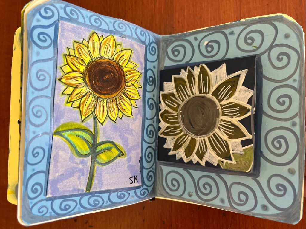 swirly patterns surrounding two sunflowers