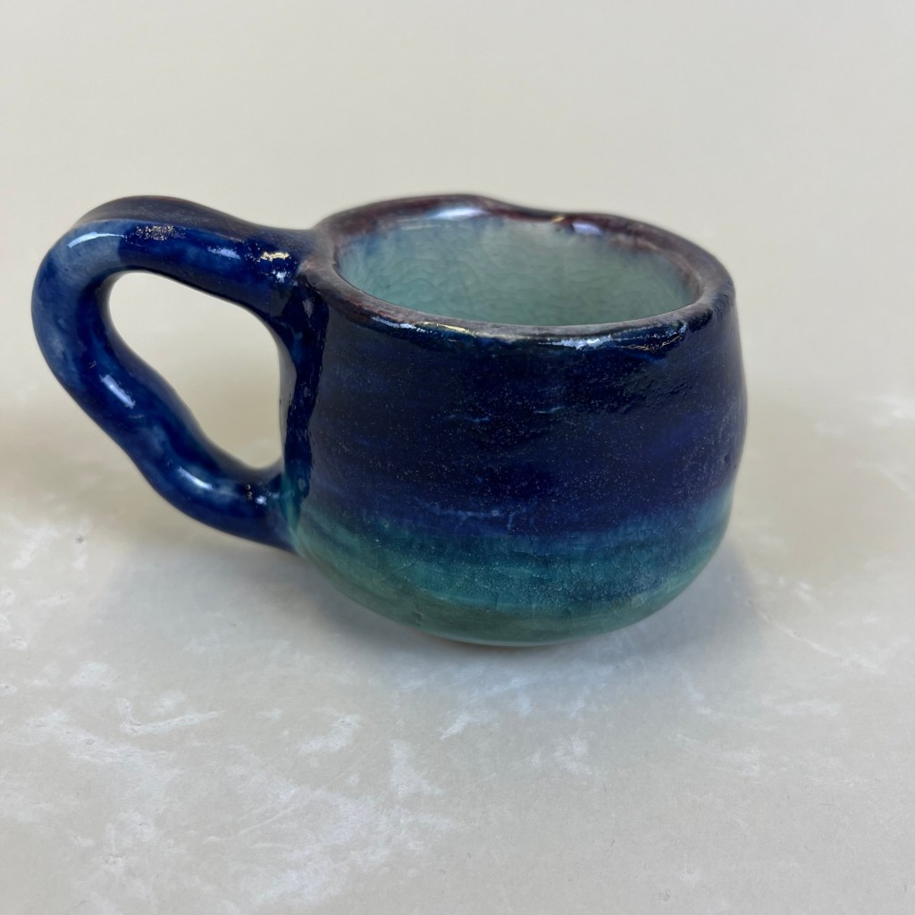 mug with a blue to green ombre